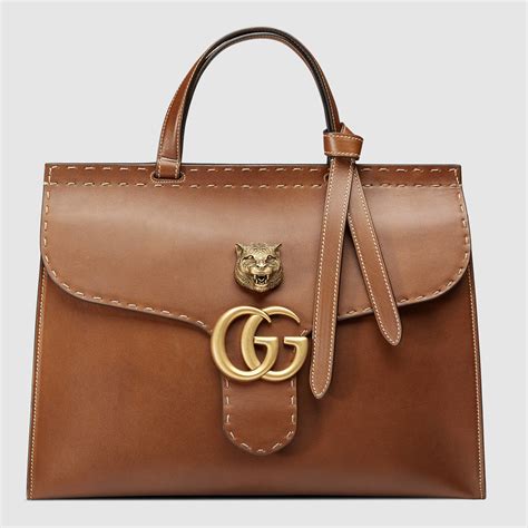 gucci brown thomas|Gucci brown leather bag vintage.